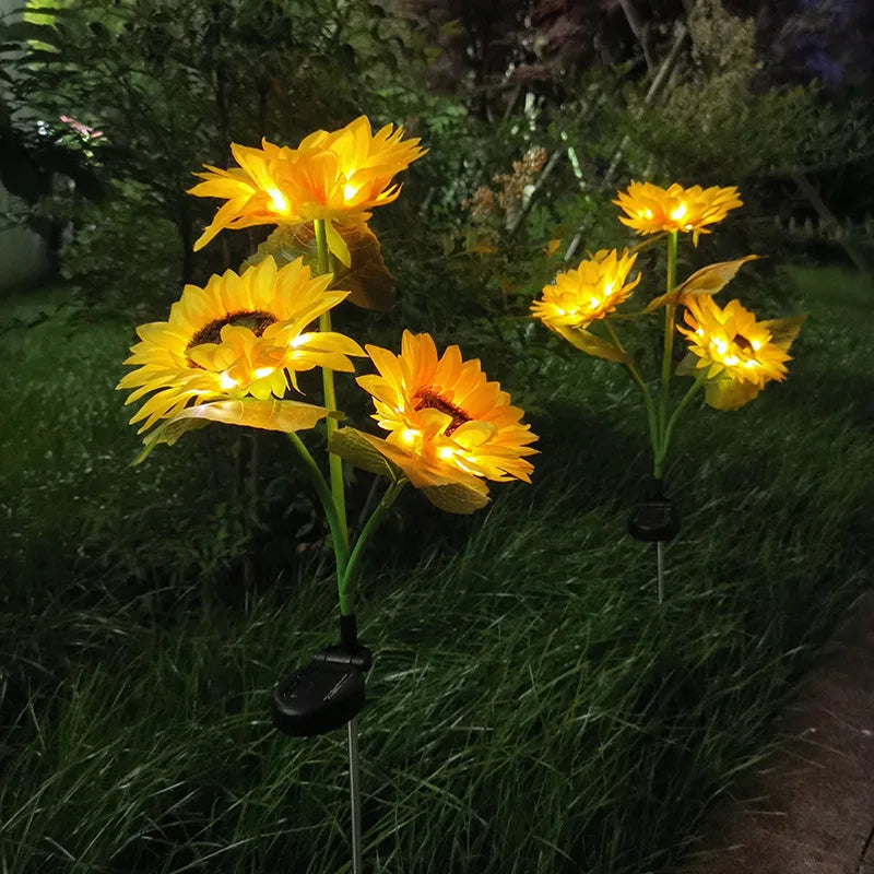 Solar Sunflower LED garden light by Showlu Smart General, bright yellow sunflower design with solar panel and LED bulbs in a garden setting.