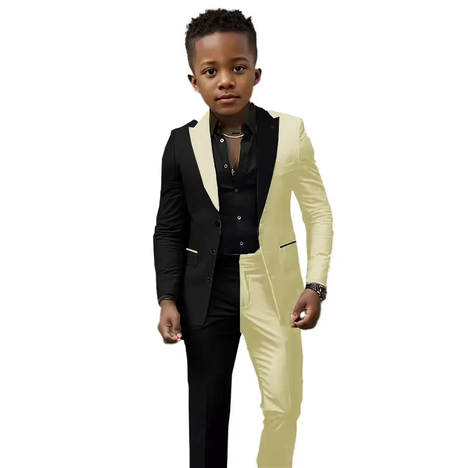 Black and white boys' wedding suit 2-piece set by Showlu Fashion, slim fit tuxedo with jacket and pants for ages 2T-16T.