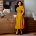 Women's puff sleeve A-line office dress with belt by SHOWLU FASHION STORE, featuring a chic, professional look in navy blue fabric.