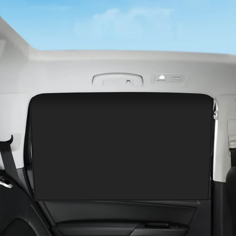 Showlu Smart General magnetic car sunshade installed on vehicle window, providing UV protection and glare reduction.