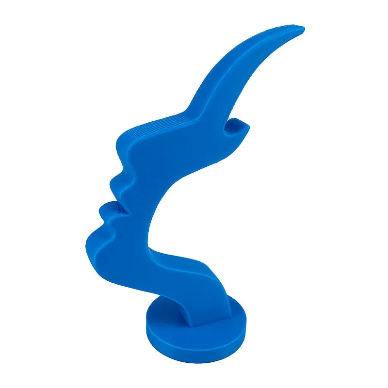 3D printed Showlu Fashion minimalist human profile eyeglass holder stand on a flat surface, showcasing its sleek, modern design.