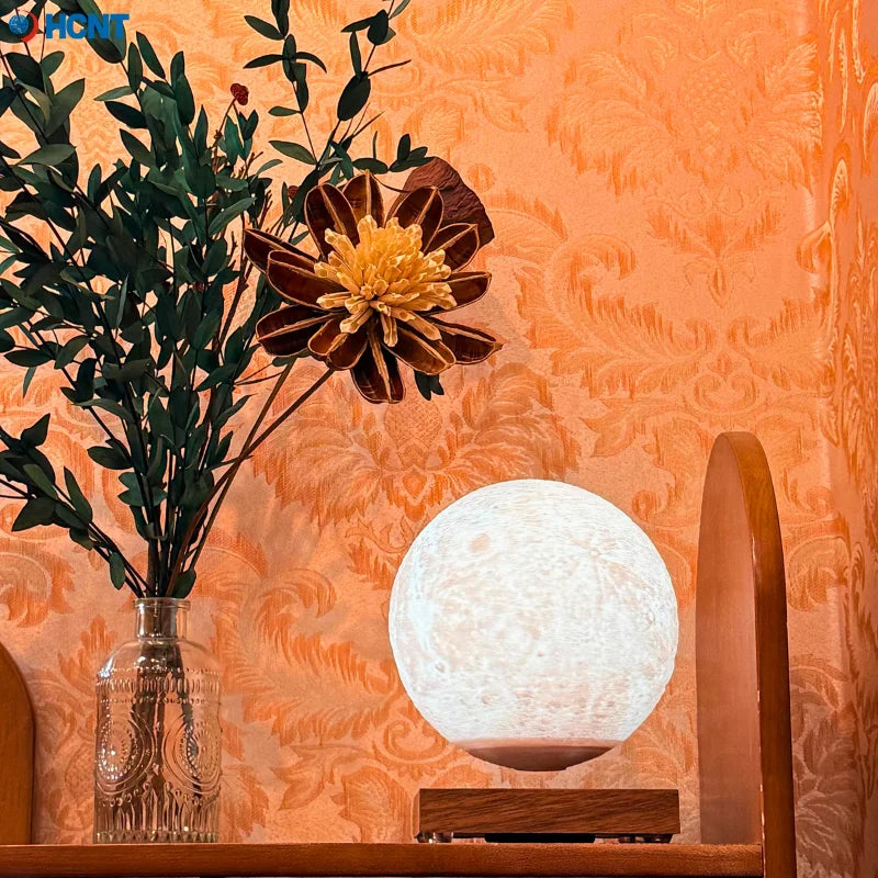 Magnetic levitating moon lamp by Showlu Smart General floating above a base with a realistic moon surface design.