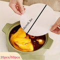 Showlu Smart General kitchen oil absorbing sheets for grease removal, featuring a stack of thin, disposable paper sheets.