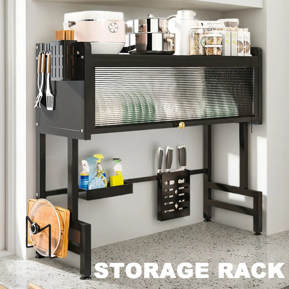 Steel over-the-sink dish drying rack with three tiers and cover organizer, shown with dishes and utensils.