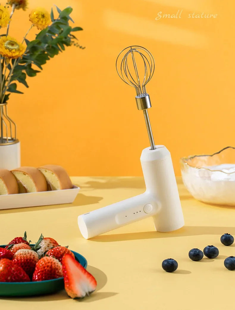 Showlu Smart General electric egg beater with stainless steel beaters and ergonomic handle, ready for kitchen baking tasks.