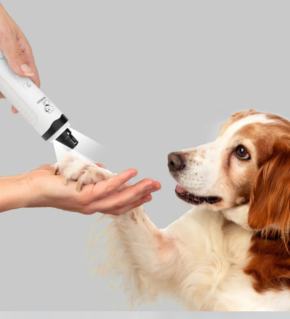 Showlu Fashion Store pet nail grinder with ergonomic design and grinding drum, ideal for trimming cats and dogs' nails easily.