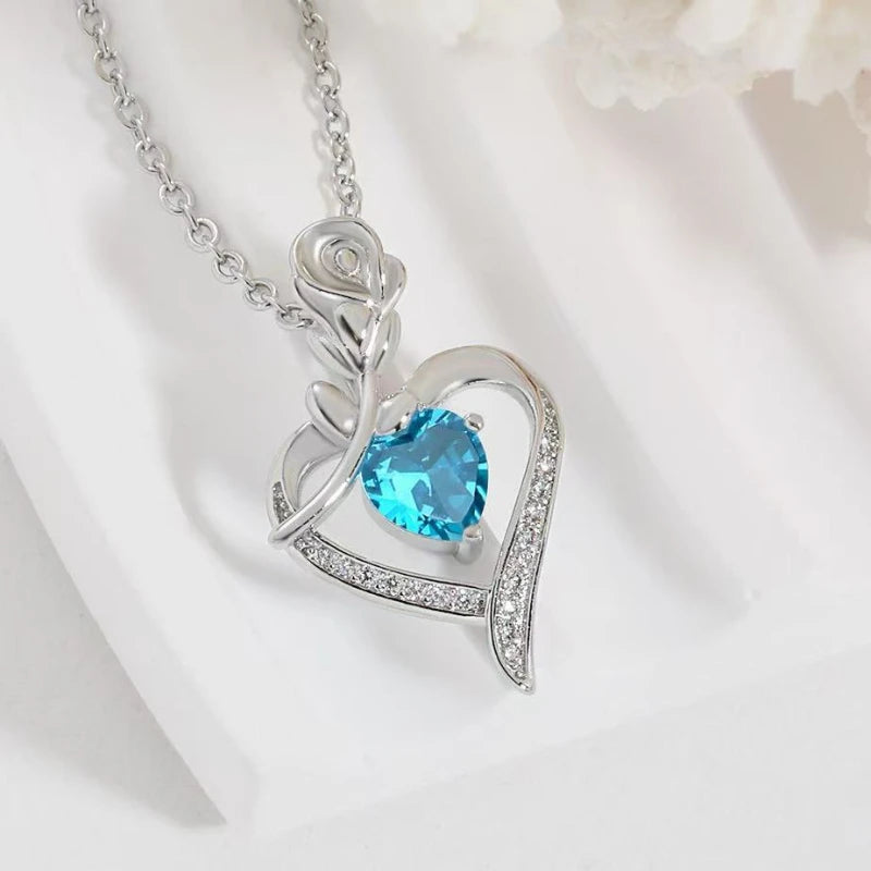 Heart-shaped pendant necklace made of hollow zinc alloy, stylish party jewelry with a delicate design.
