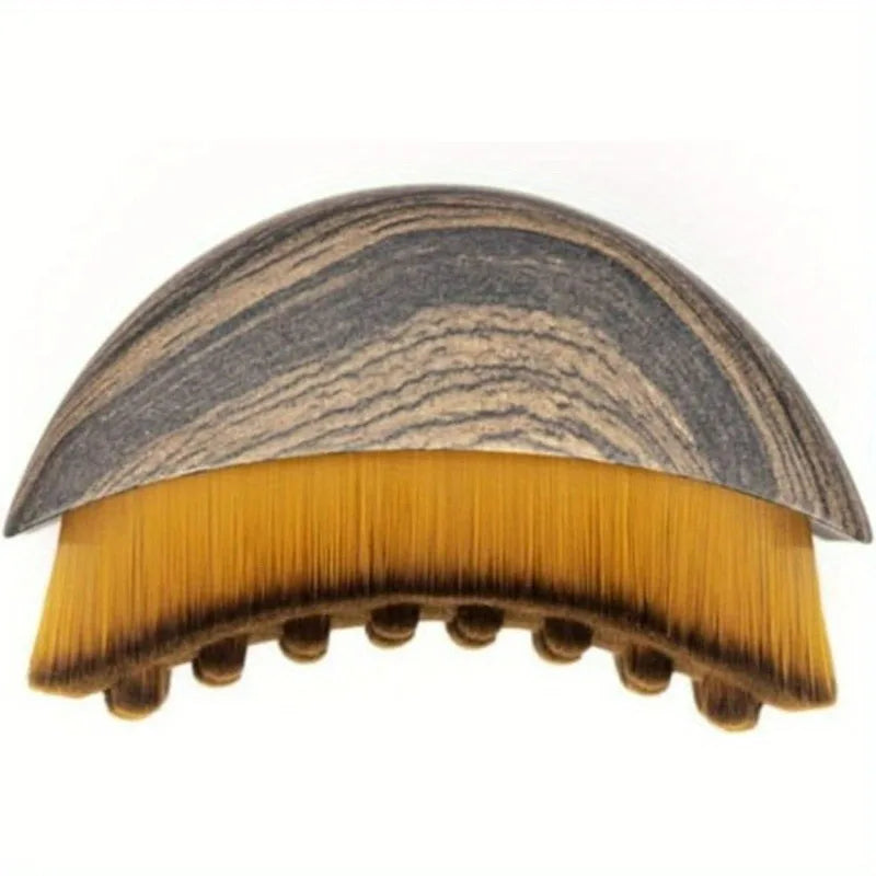 Lymphatic contour face brush by Stone's Store with soft bristles for facial massage and lymphatic drainage therapy.