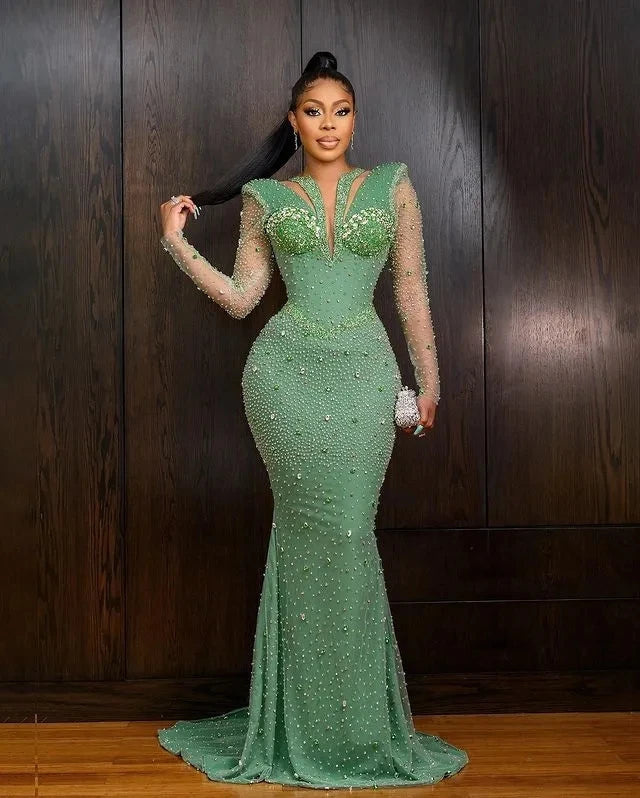 Green African Aso Ebi mermaid evening dress with long sleeves, crystals, and a fitted silhouette for formal parties and prom nights.