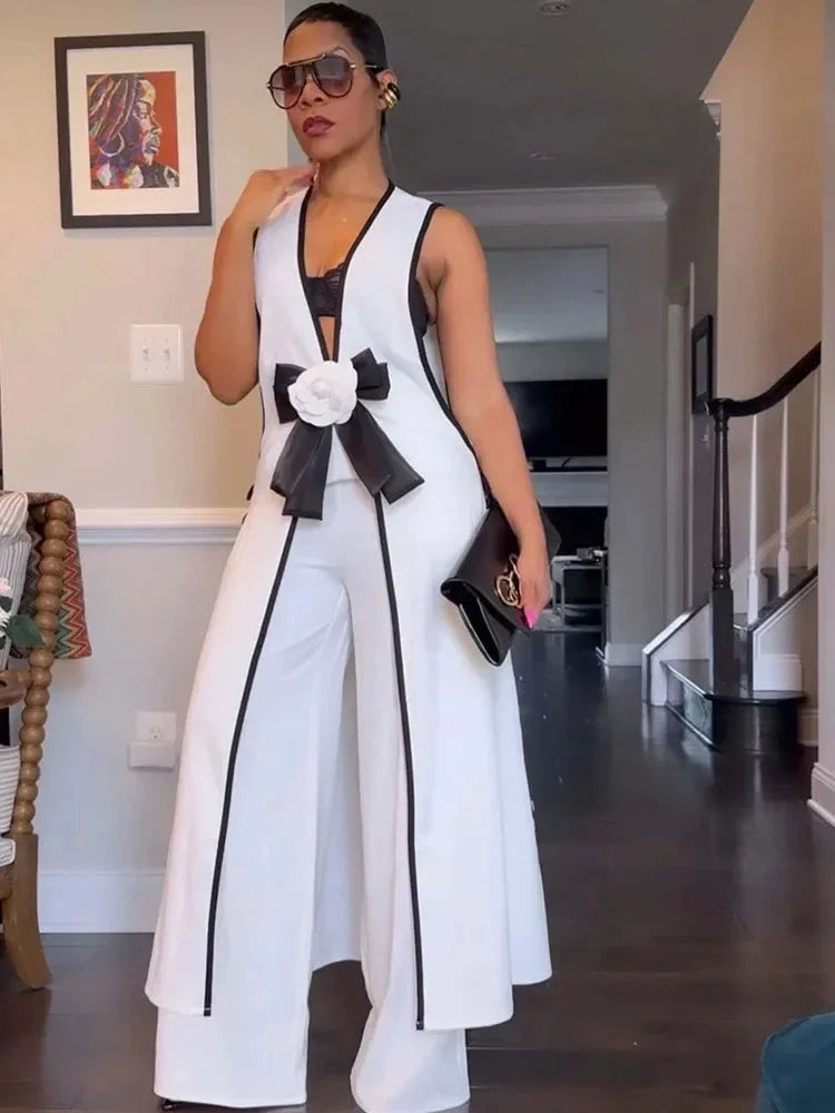 Doyerl Women's V-neck bow tie top and wide-leg pants two-piece set, stylish fashion look, black color, shown on a model.