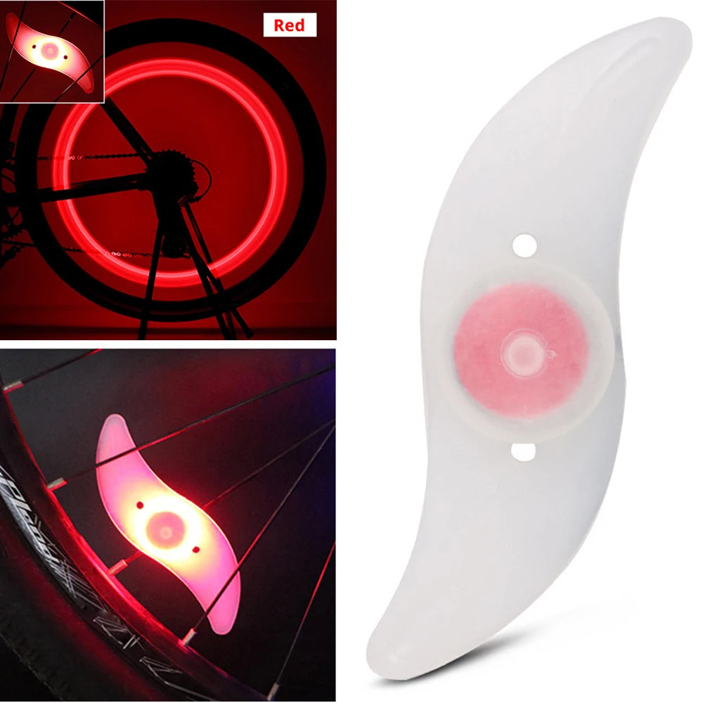 Showlu Smart General bicycle spoke LED wheel light flashing on a tire, enhancing visibility and safety during night riding.