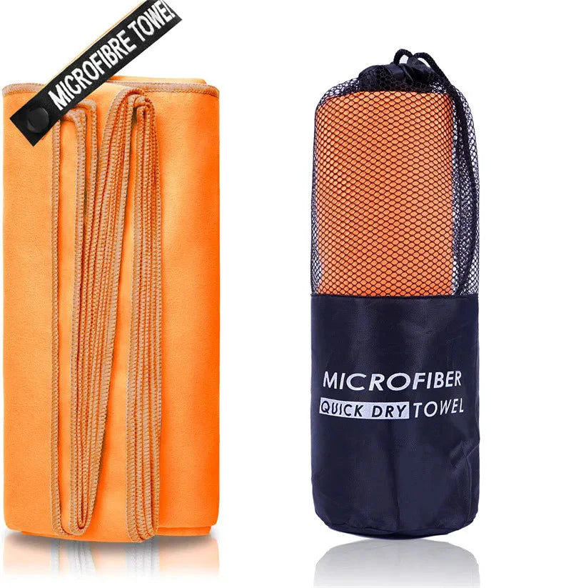 SHOWLU microfiber sports towel for gym, swimming, and beach, quick-drying and lightweight for active outdoor use.