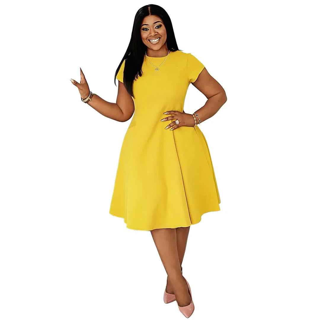 Plus size short sleeve midi dress for women, street style casual summer outfit, oversized fit, vibrant spring fashion by Showlu Fashion