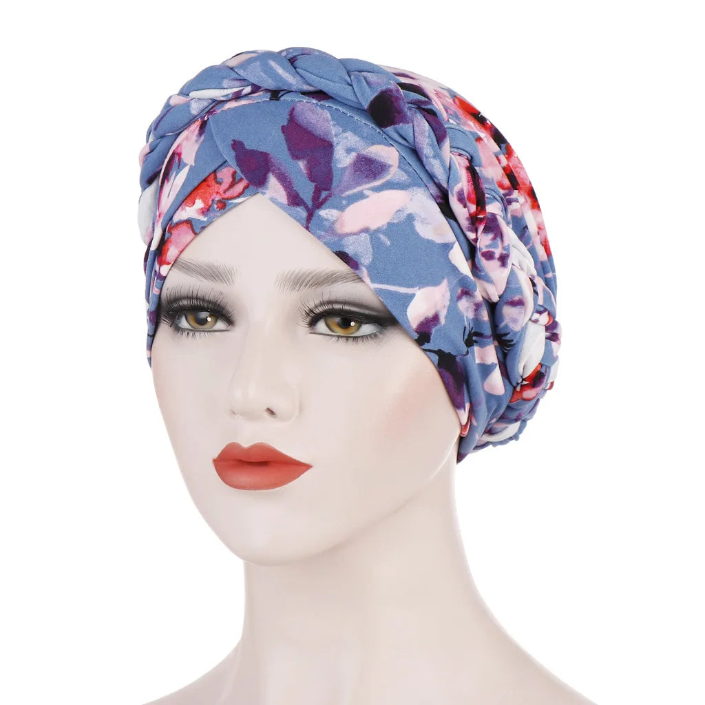 European and American print leopard silk scarf hat with flower and braid details, stylish Muslim hijab for women by Showlu Fashion.