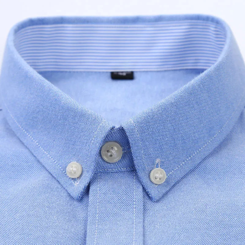 Showlu men's slim fit Oxford shirt with long sleeves, non-iron casual top in classic blue fabric, tailored for a sharp look.