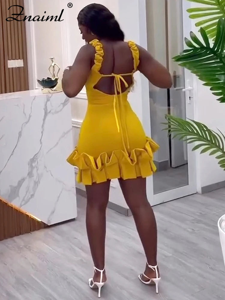 Yellow ruffle bodycon mini dress with spaghetti straps, V-neck, backless design, ideal for prom or evening events, by Showlu Fashion.