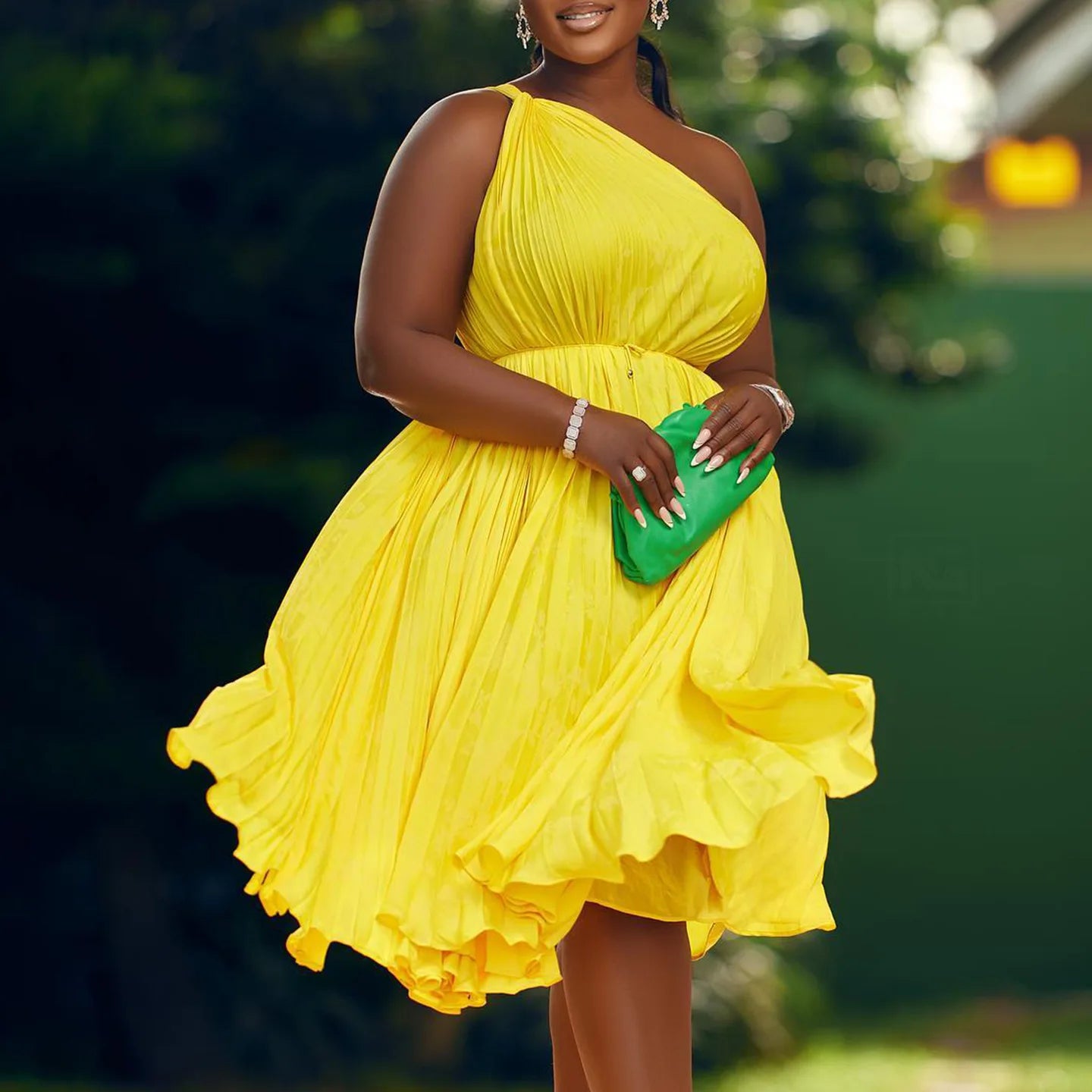 Women’s one-shoulder sleeveless pleated swing dress by Showlu Fashion, knee-length, stylish 2023 streetwear dress with a sexy, chic look.