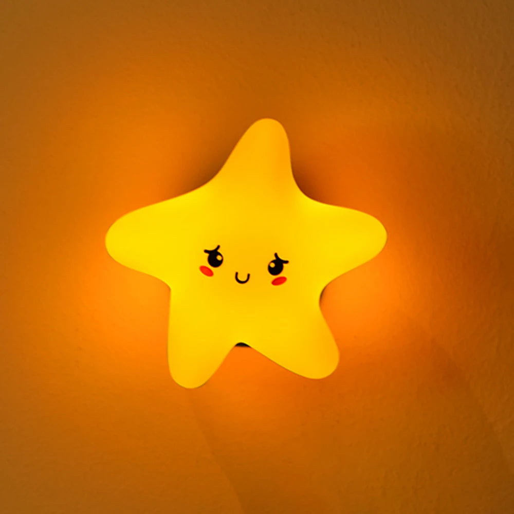 Star-shaped silicone LED night light by Showlu Smart General emits soft glow, ideal for bedrooms or nurseries.
