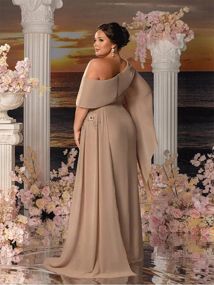 Apricot chiffon plus size strapless floor-length gown by Showlu Fashion showing flowing fabric and elegant design.