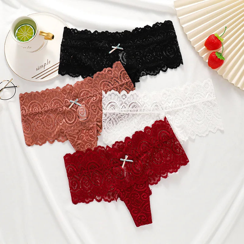 Sexy lace women's thong from Showlu Fashion, low-waist breathable G-string lingerie with delicate lace details and minimal coverage.