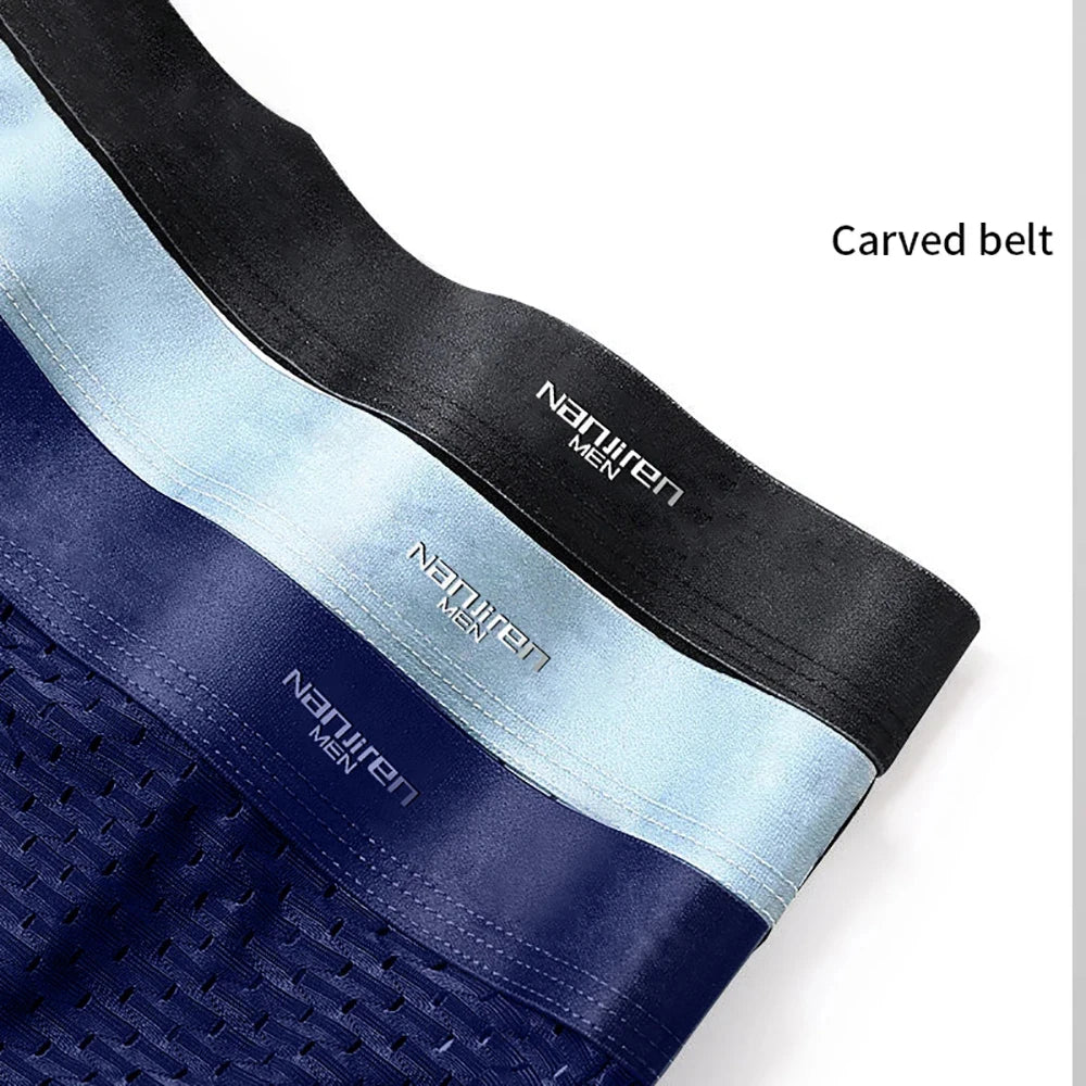 Showlu men's ice silk boxer shorts with breathable mesh polyester fabric, featuring a comfortable, lightweight design for everyday wear.