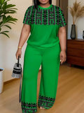 Casual summer outfit for women featuring a stylish top and pants set in plus size, perfect for streetwear fashion.