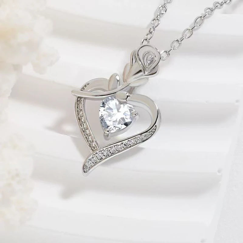Heart-shaped pendant necklace by ZHIXUN featuring a hollow zinc alloy design, perfect for stylish party jewelry.