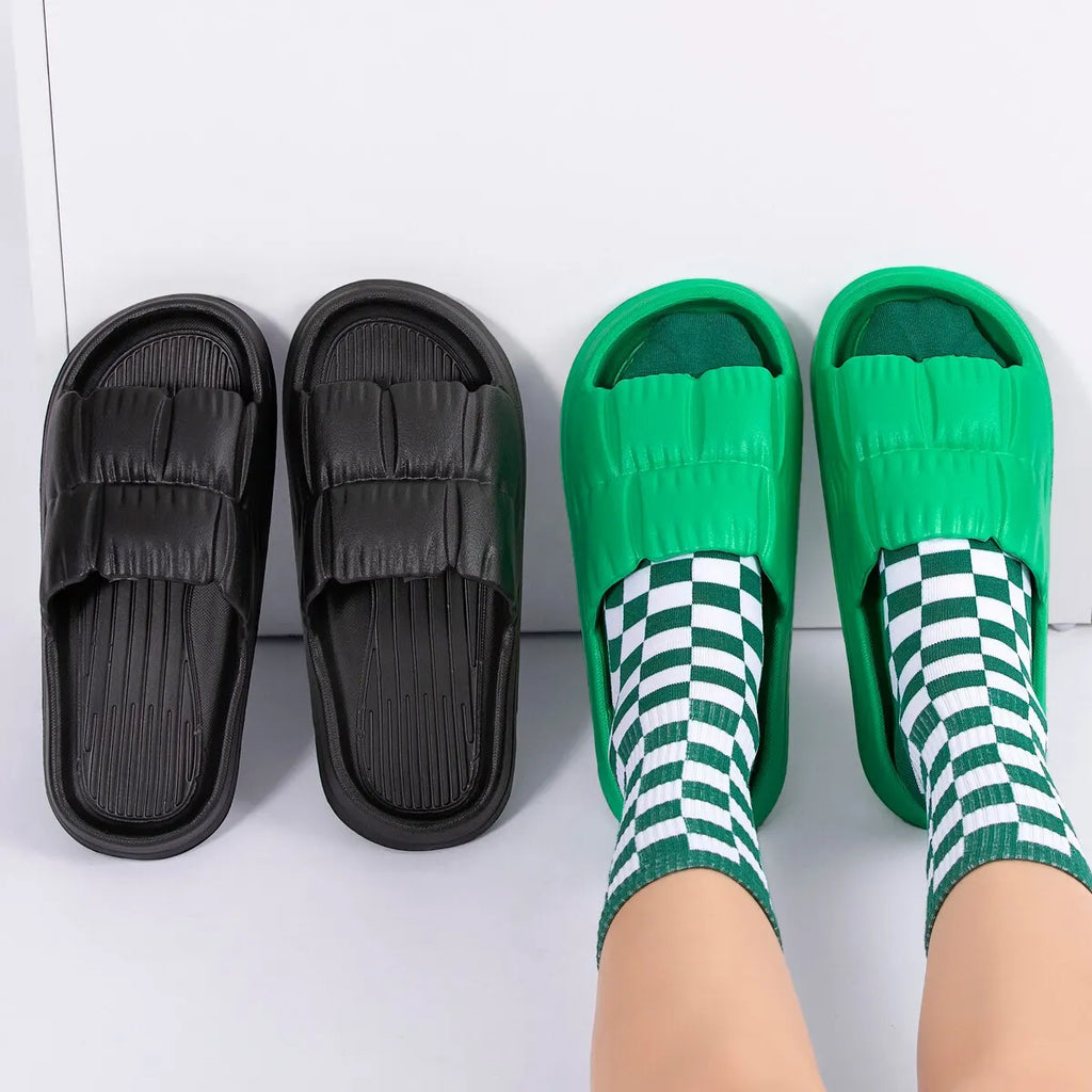 Women’s soft sole cloud slippers by Showlu Fashion, thick platform EVA flip flops with non-slip soles, suitable for indoor and outdoor summer wear.