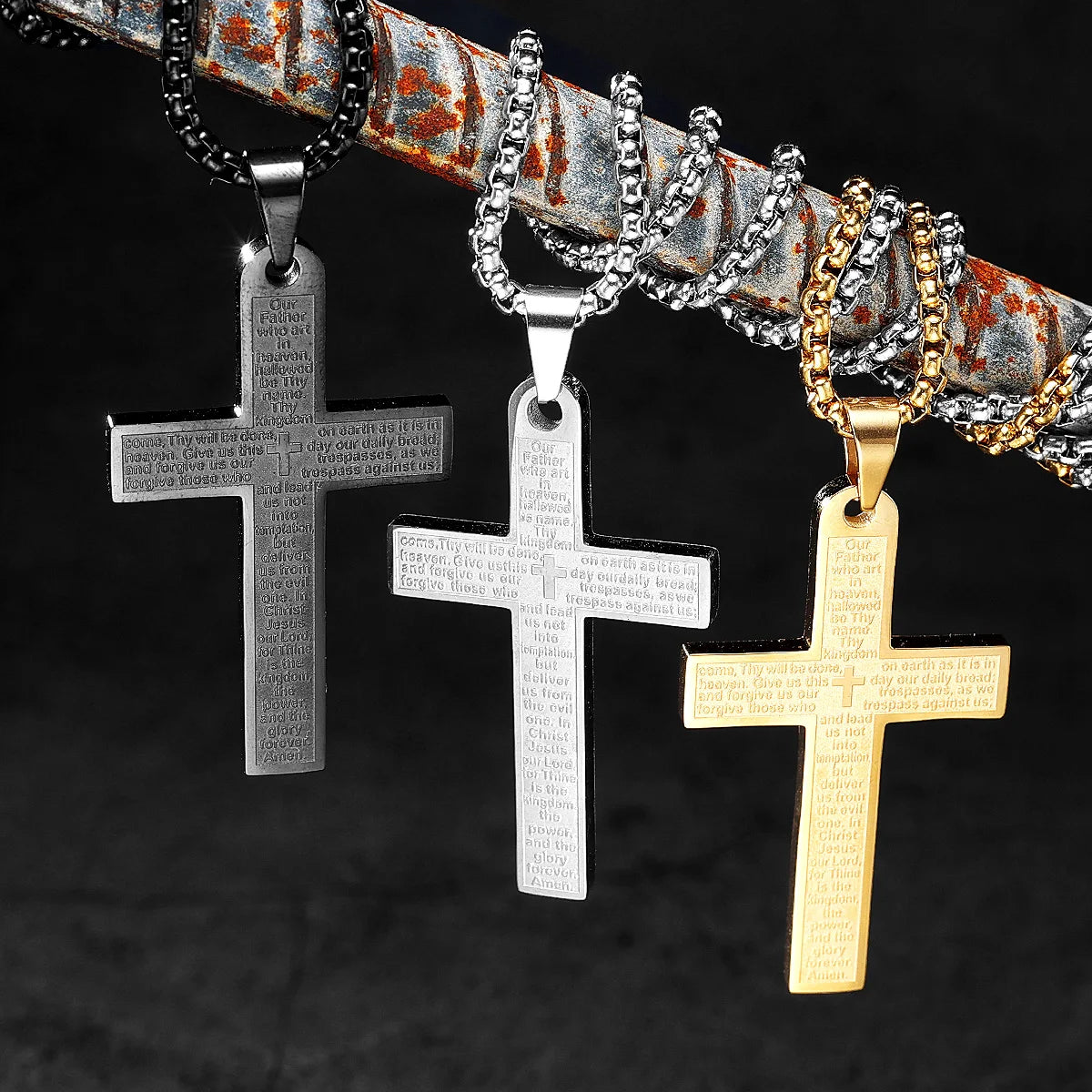 Stainless steel cross pendant necklace featuring punk-inspired design, showcasing a metal religious jewelry piece with intricate detailing.