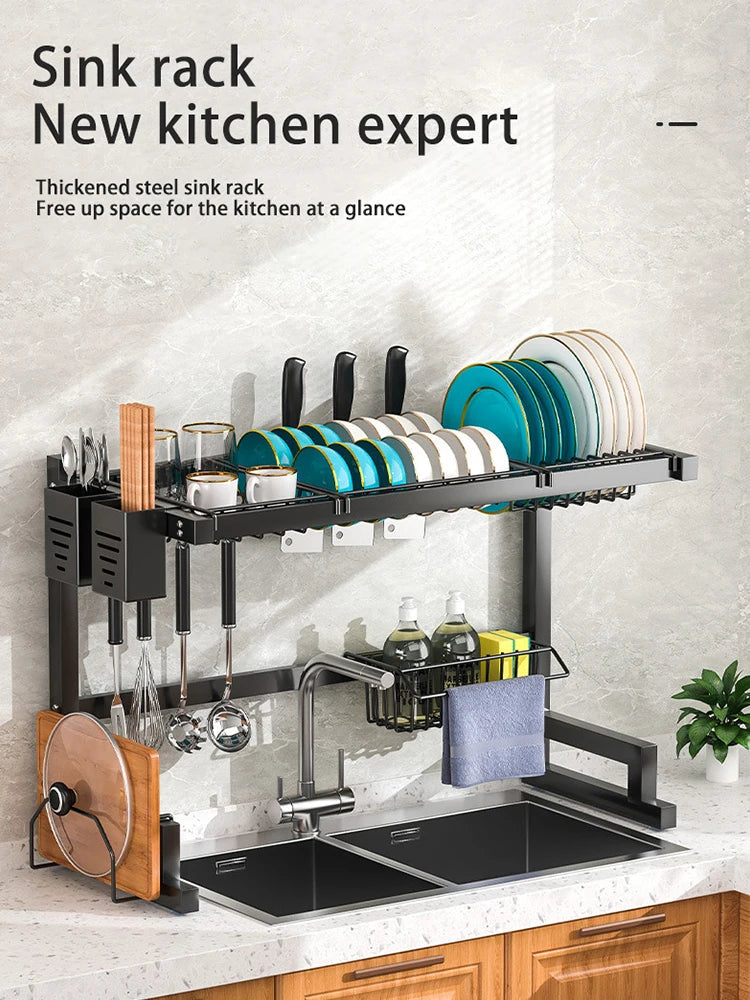 Stainless steel kitchen sink dish drain rack and utensil holder with multiple compartments for drying and organizing dishes.