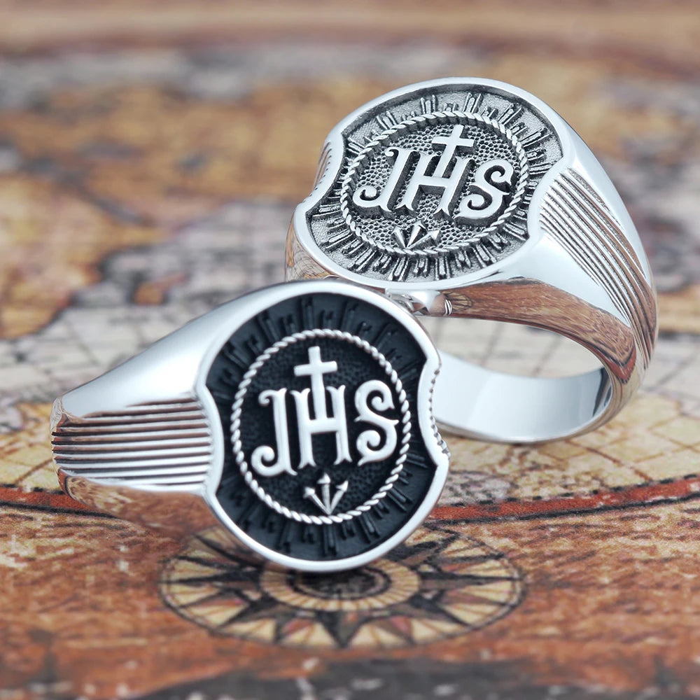 Sterling silver Christian band ring with Jesus Christ Chi Rho IHS symbol, featuring a detailed religious design and polished finish