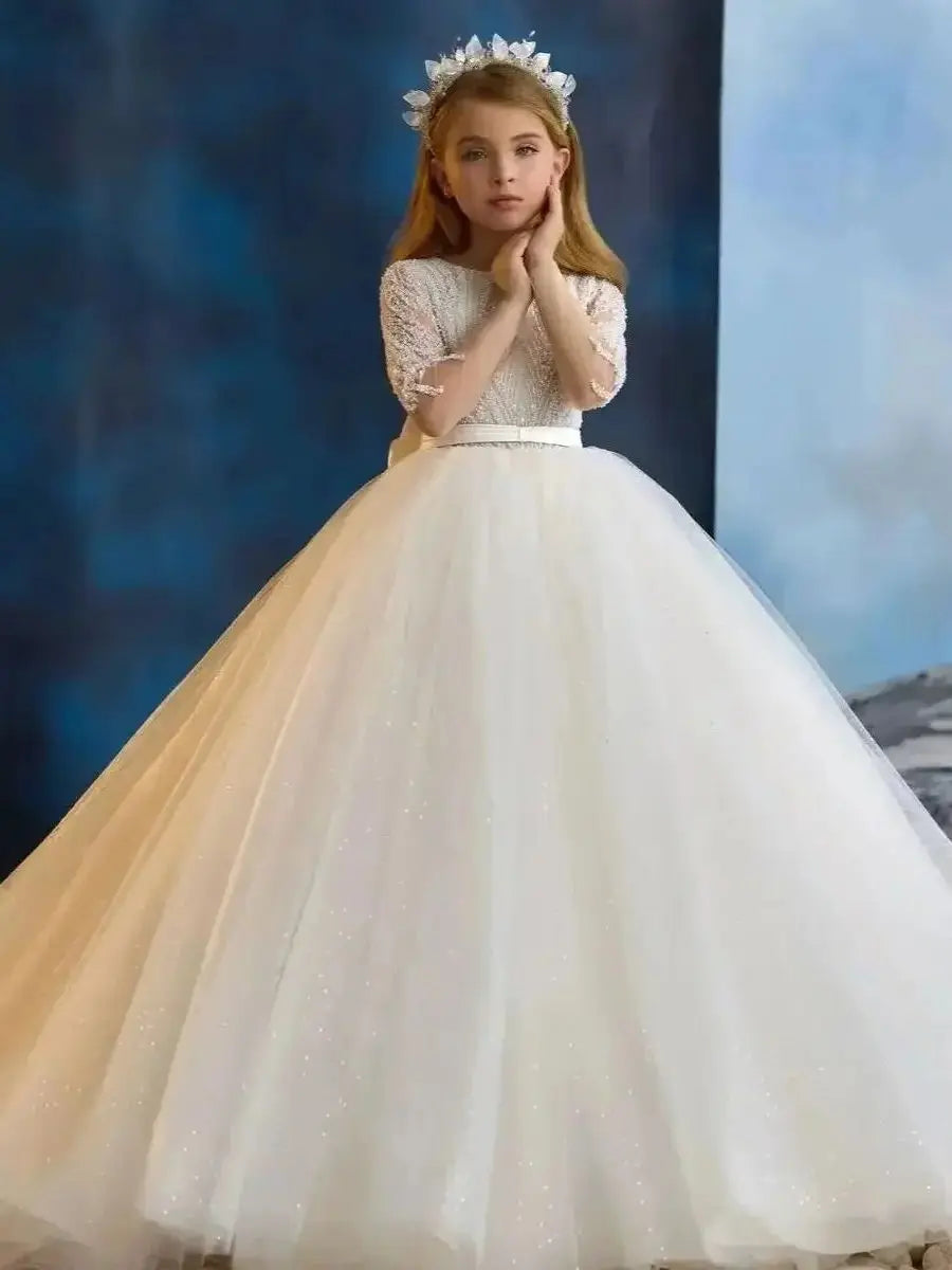 Showlu Smart Princess flower girl dress with full sleeves, beaded bow, tulle fabric, floor length for wedding and birthday occasions.