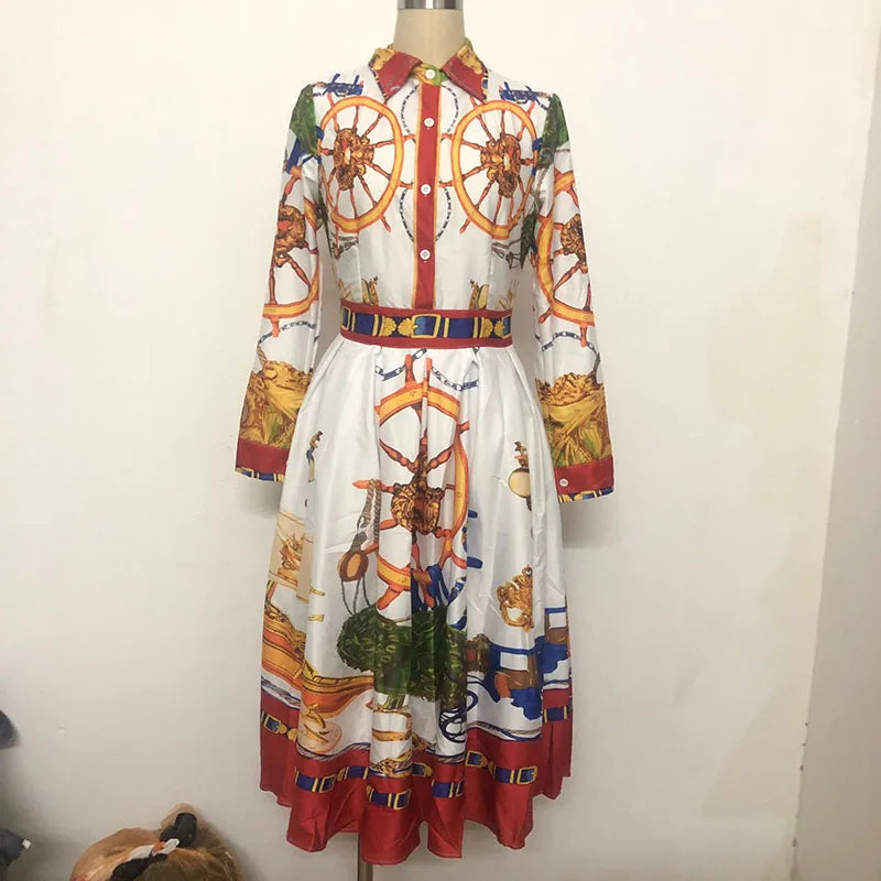 SHOWLU Women's printed A-line high waisted midi dress with elegant design, showcased on a model.