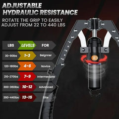 A black hydraulic arm trainer with an adjustable resistance dial and a level guide chart.