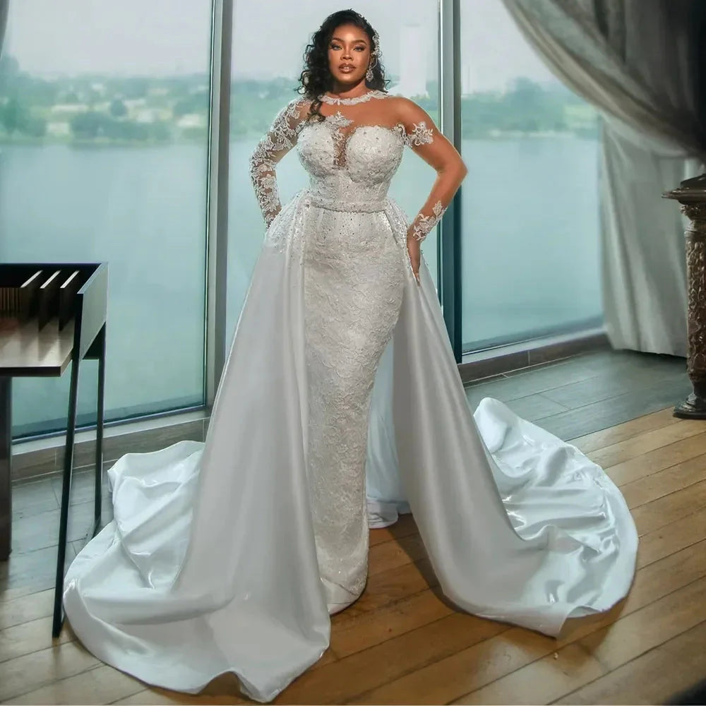 Vinca Sunny Arabic Mermaid wedding dress with lace applique and beaded details, showcasing a fitted silhouette and elegant design.
