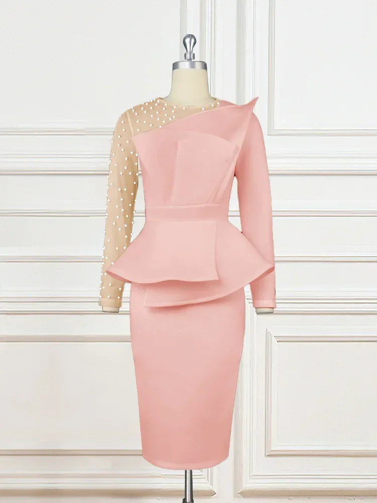 Elegant white women's party dress with long sleeves, beading, mesh patchwork, and peplum design, perfect for evening events