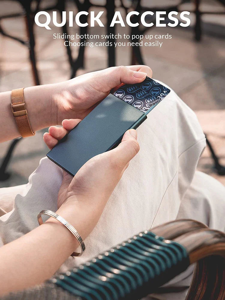 Showlu minimalist slim metal RFID blocking pop-up card holder wallet with compact design and secure card storage.