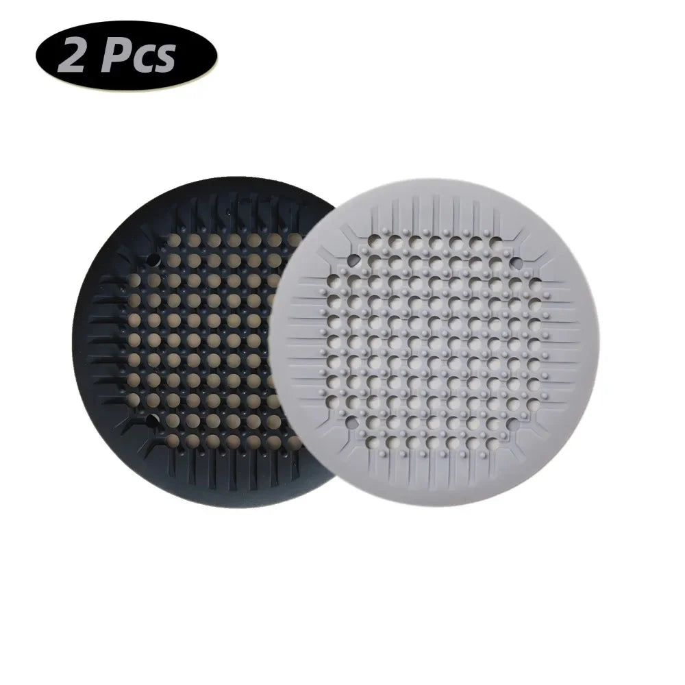 Showlu Smart General silicone drain cover with small holes for preventing debris from clogging sinks or drains.