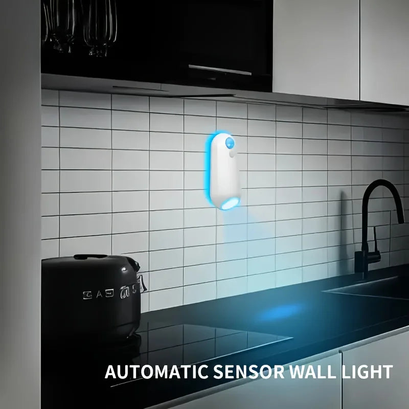 Showlu Smart General motion sensor mouse LED night light illuminating a dark room with a sleek, compact design