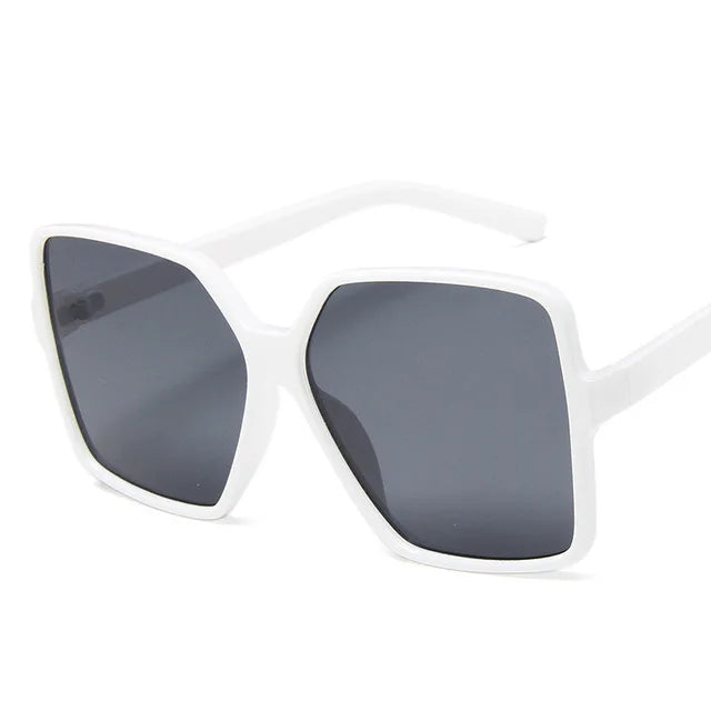 Oversize women's sunglasses by Showlu Fashion, gradient plastic frames with UV400 protection, fashionable designer sun glasses