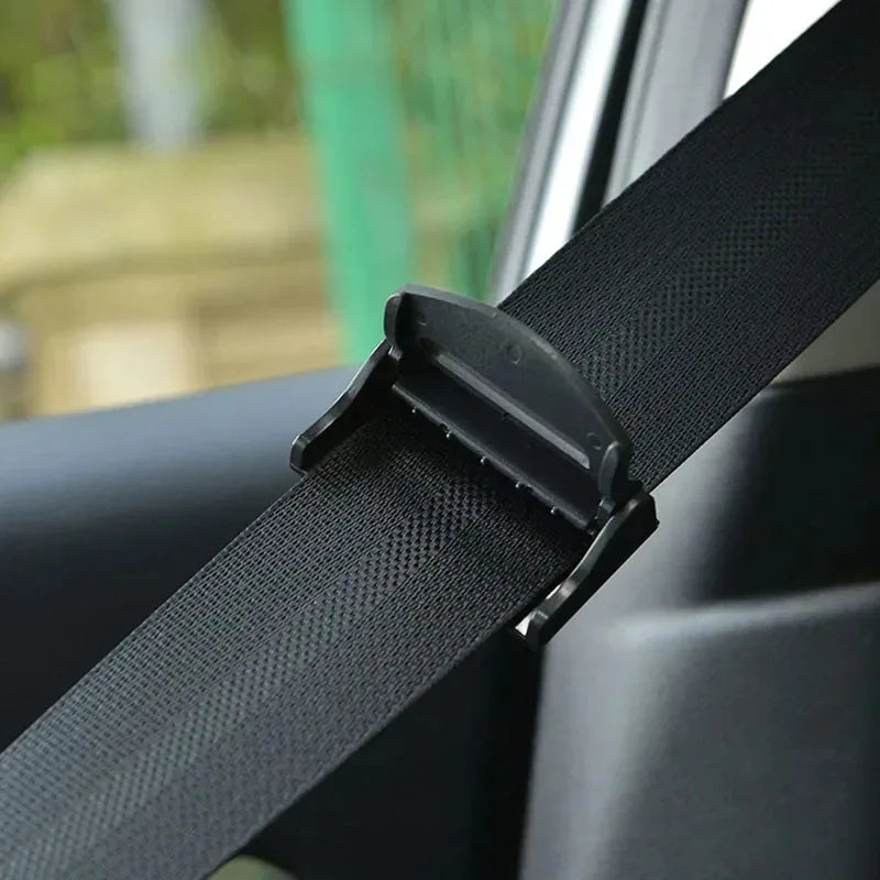 Showlu Smart General car seatbelt adjuster attached to seatbelt, helping improve fit and comfort during driving.