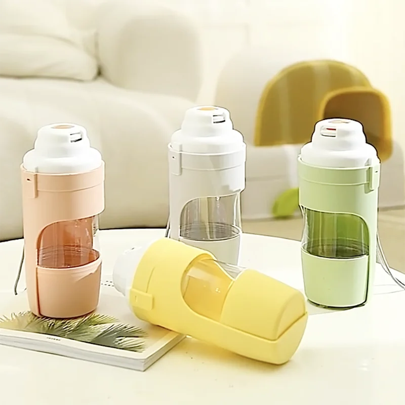 Showlu 2-in-1 portable pet travel water bottle and food container, 500ml, with a compact design for pet on-the-go hydration and feeding.