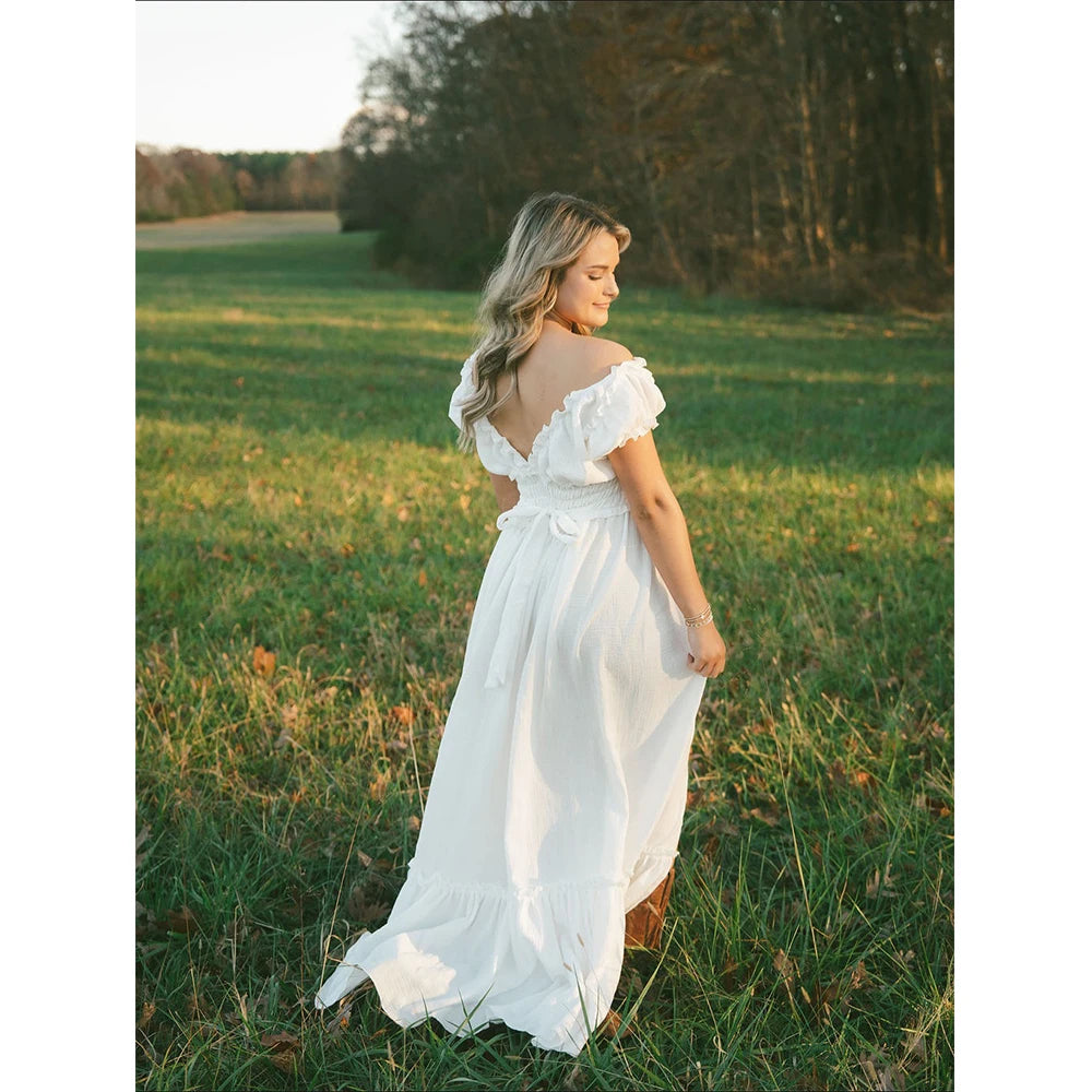 Showlu Bohemian maternity maxi gown with off-shoulder ruffled design, perfect for photos and special occasions.