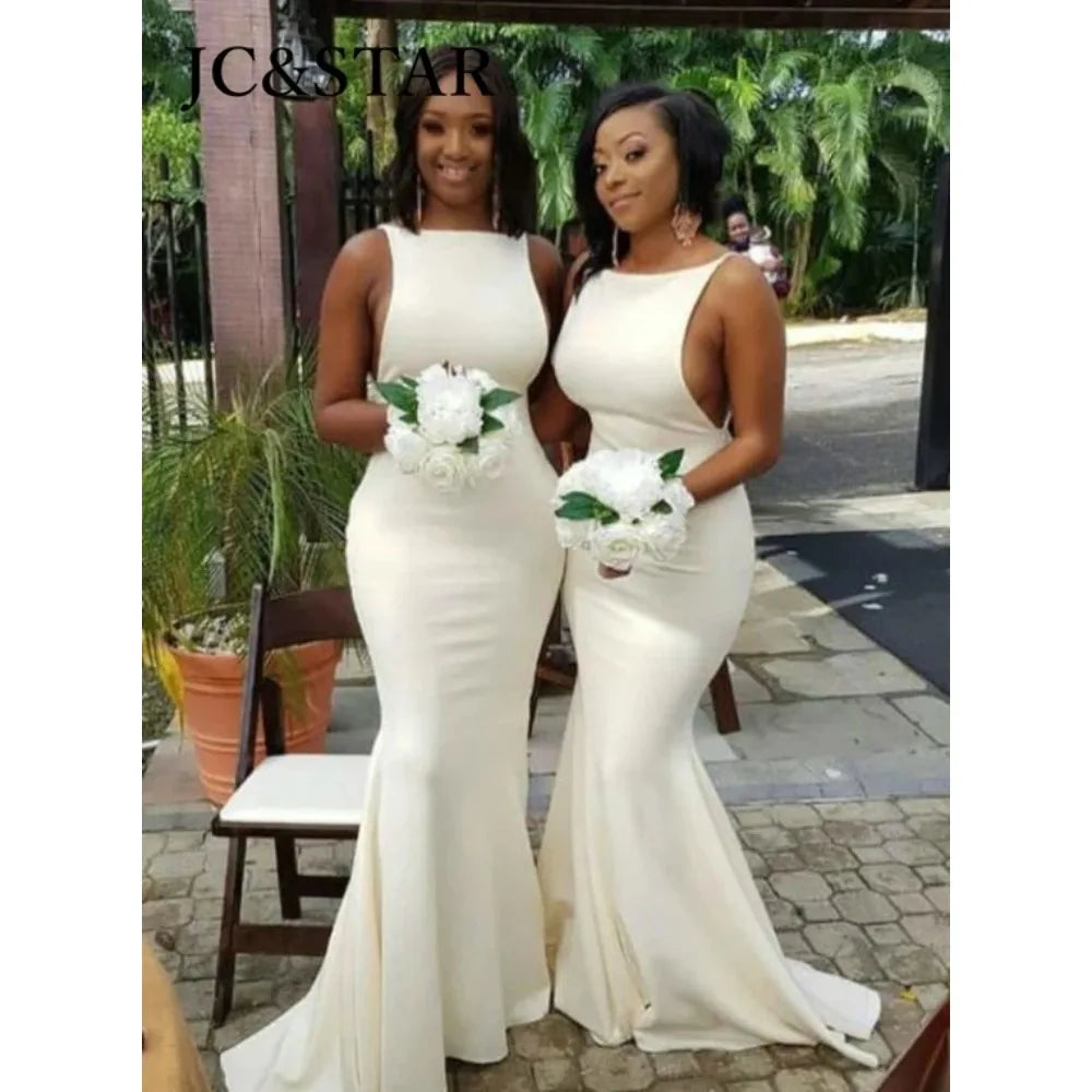 Turquoise JC&STAR mermaid satin bridesmaid dress with sexy backless design, elegant and fitted gown for special occasions.