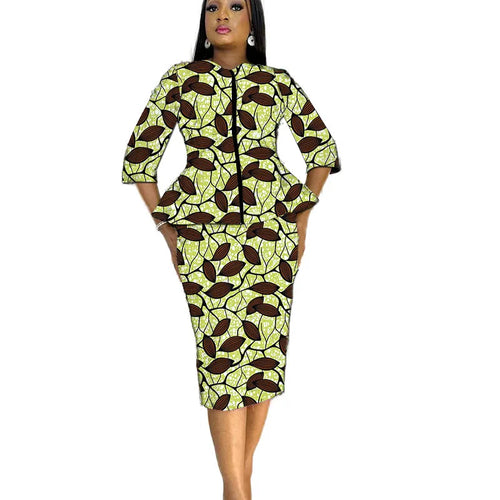African print women's party outfit featuring a tailor-made blouse and skirt set with vibrant, traditional fabric and intricate patterns.
