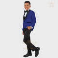 Boy's white tuxedo suit with formal jacket, vest, and pants by SHOWLU FASHION STORE, suitable for special occasions.