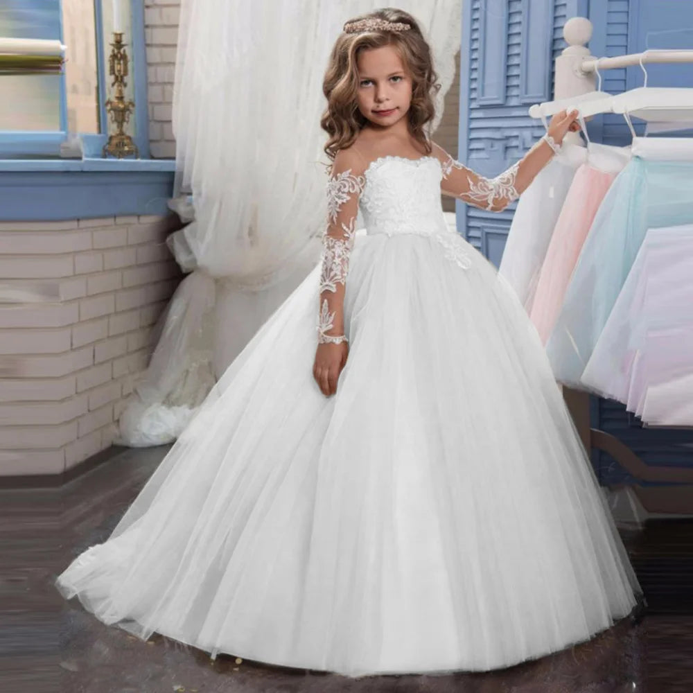 Light pink flower girl dress with white appliques, tulle fabric, long sleeves, perfect for weddings, birthdays, and communion events.