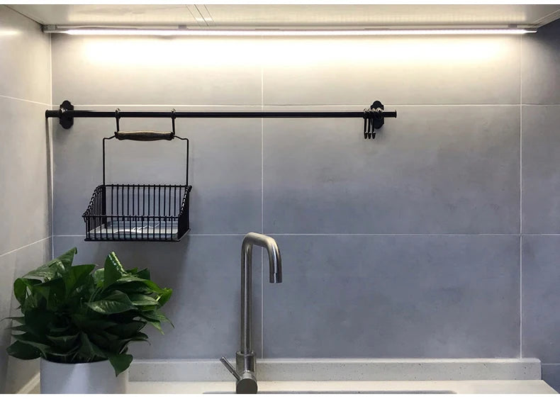 Showlu Smart General CHNAITEKE motion sensor LED light mounted on a wall with a modern design for automatic lighting.