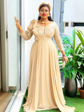Elegant African dress for women featuring vibrant Ankara fabric, long plus-size dashiki robe suitable for weddings and parties.