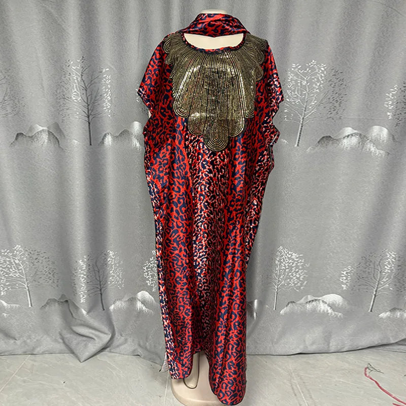 Elegant 2026 African dress for women featuring traditional dashiki Ankara fabric, long gown style with Muslim-inspired abaya design.